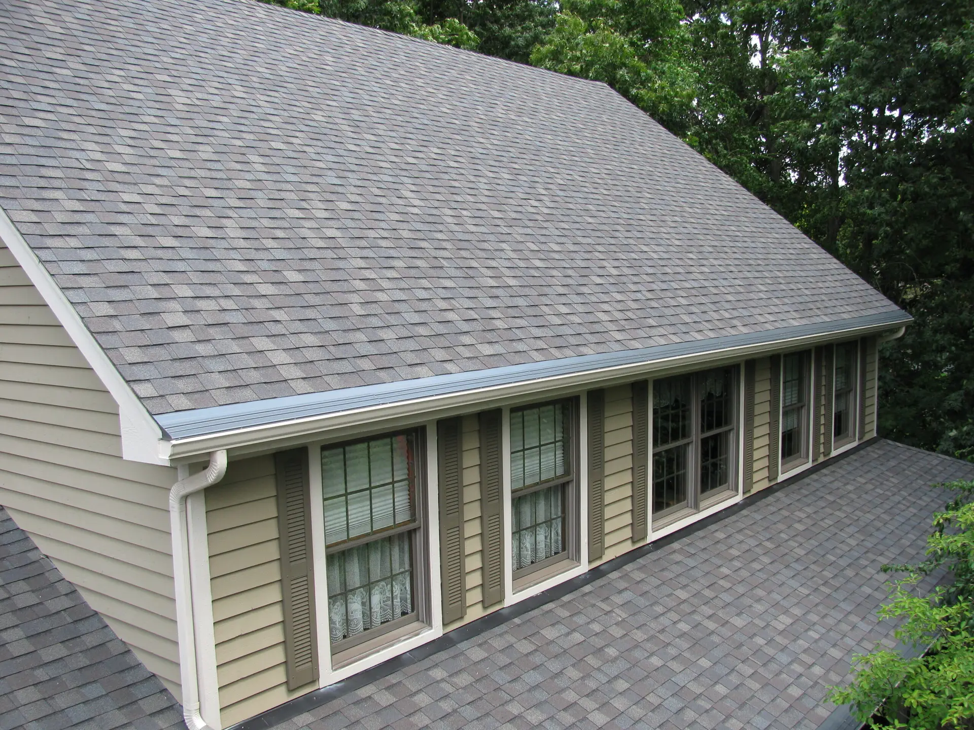 Professionally installed seamless gutters on a Mid-Michigan home